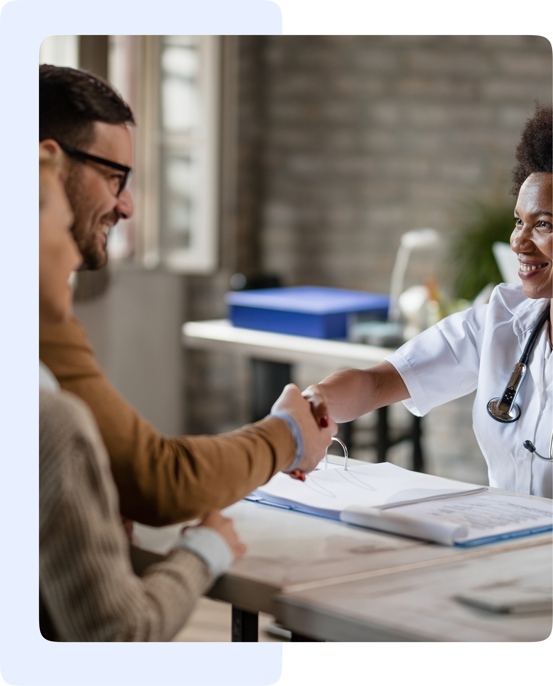Doctor consulting with elderly patient
